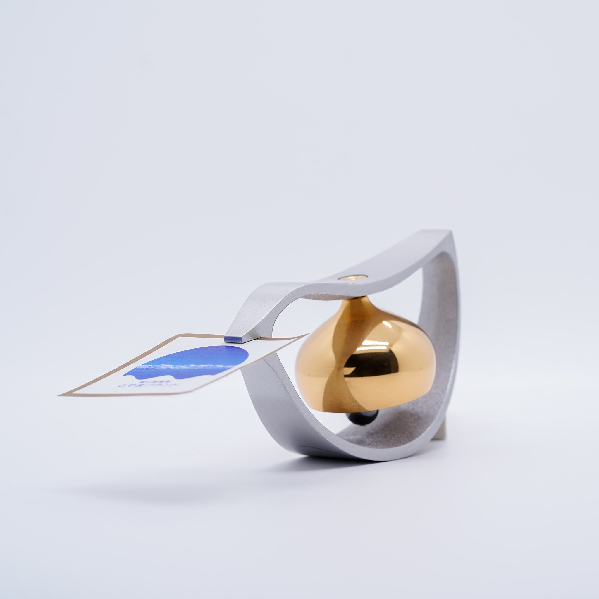 Kotori cast brass orin bell angled view with product card, by Yamaguchi Kyujo, Takaoka, Toyama, Japan