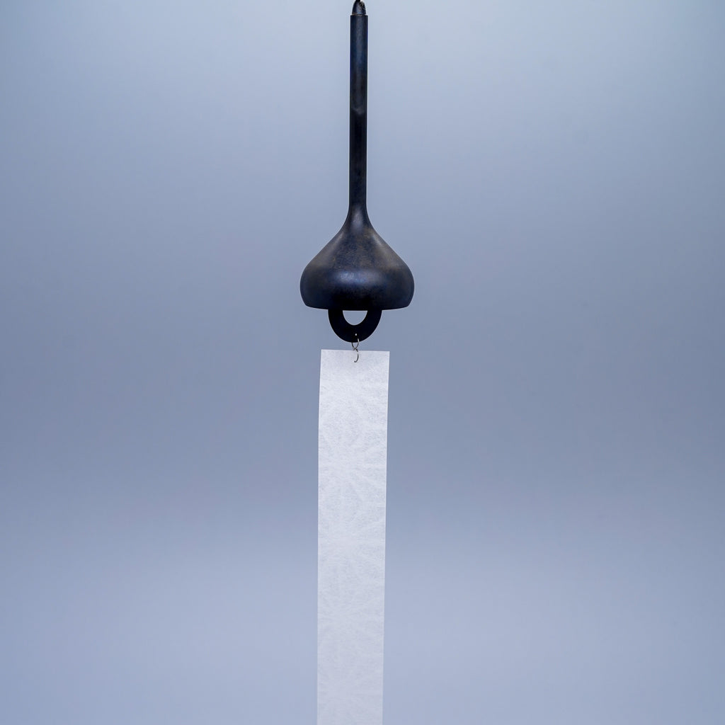 Onion brass wind chime in black by Nousaku, Takaoka, Toyama, Japan, with paper clapper hanging