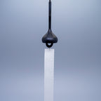 Onion brass wind chime in black by Nousaku, Takaoka, Toyama, Japan, with paper clapper hanging