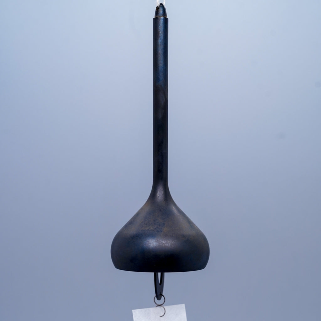 Onion brass wind chime in black close-up showing layered form, by Nousaku, Takaoka, Toyama, Japan