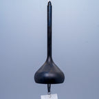 Onion brass wind chime in black close-up showing layered form, by Nousaku, Takaoka, Toyama, Japan