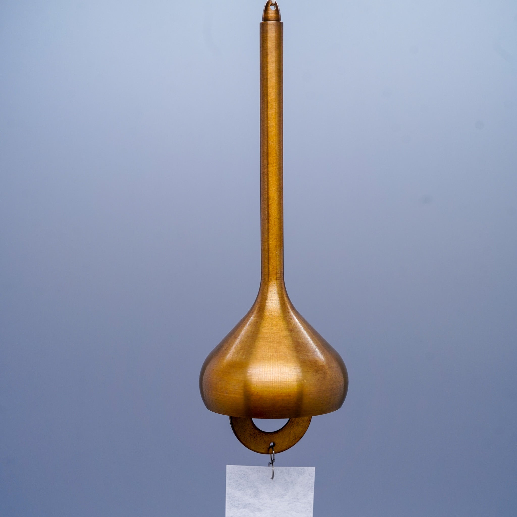 Onion brass wind chime in gold close-up showing layered form, by Nousaku, Takaoka, Toyama, Japan