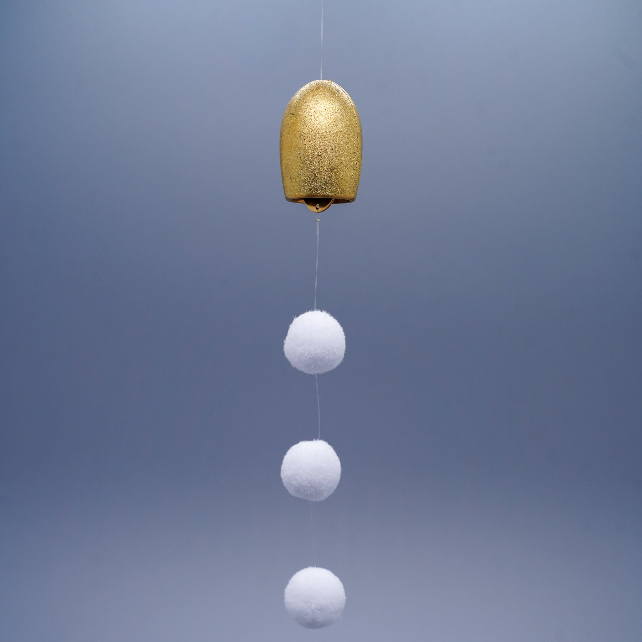 Tsubomi petal-shaped brass wind chime in gold by Nousaku, Takaoka, Toyama, Japan, with cotton ball clappers