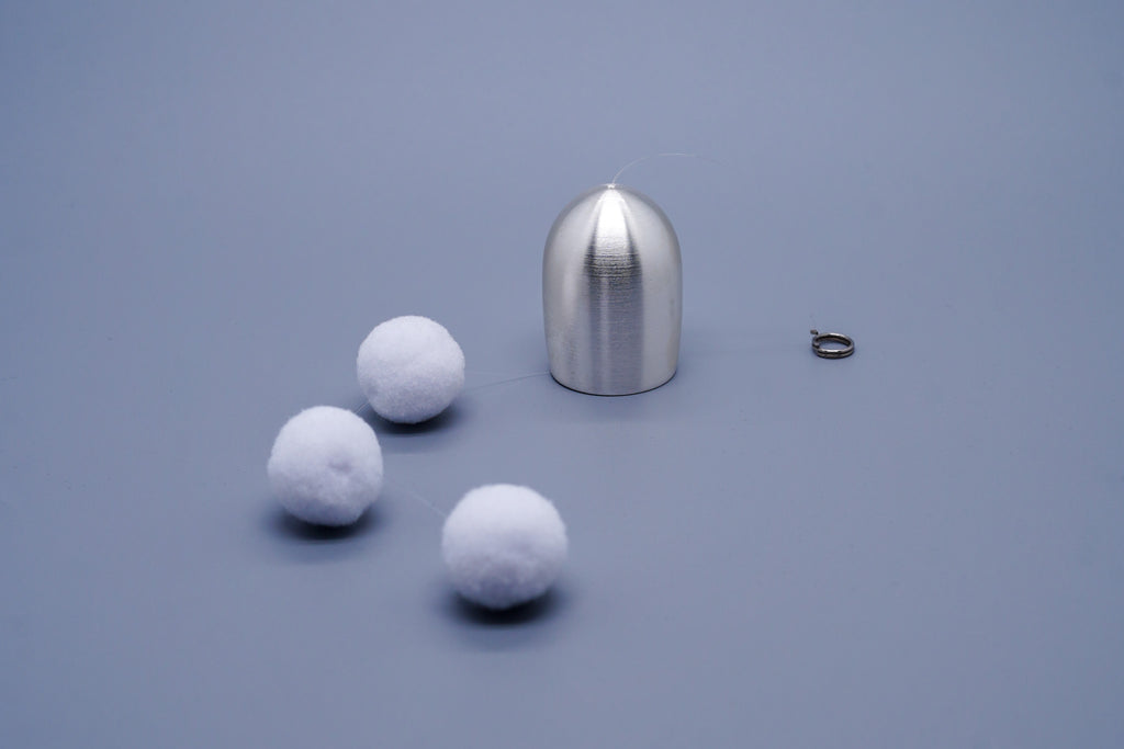 Tsubomi brass wind chime in silver with components laid flat including cotton ball clappers and cord ring, by Nousaku, Japan