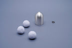 Tsubomi brass wind chime in silver with components laid flat including cotton ball clappers and cord ring, by Nousaku, Japan