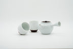 Hasami-yaki white porcelain teapot set showing kyusu, two teacups and lid, handcrafted in Nagasaki, Japan