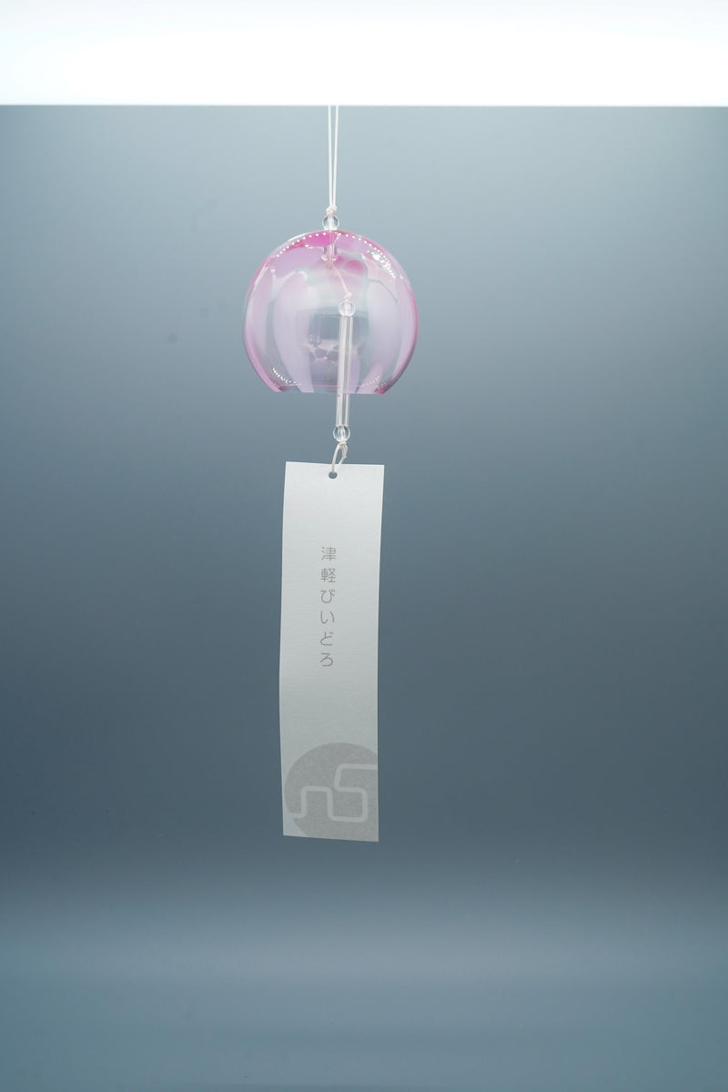 Adelia hand-blown glass wind chime in pink by Tsugaruvidro, Aomori, Japan, hanging with paper strip and brand tag