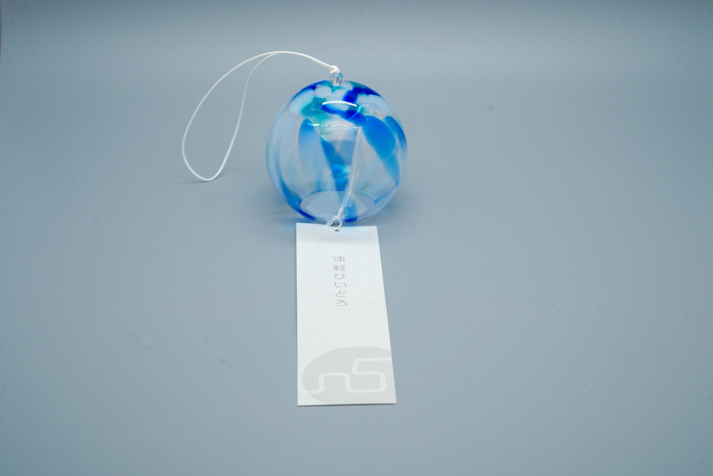 Adelia hand-blown glass wind chime in blue close-up showing swirling glass pattern and cord, by Tsugaruvidro, Aomori, Japan